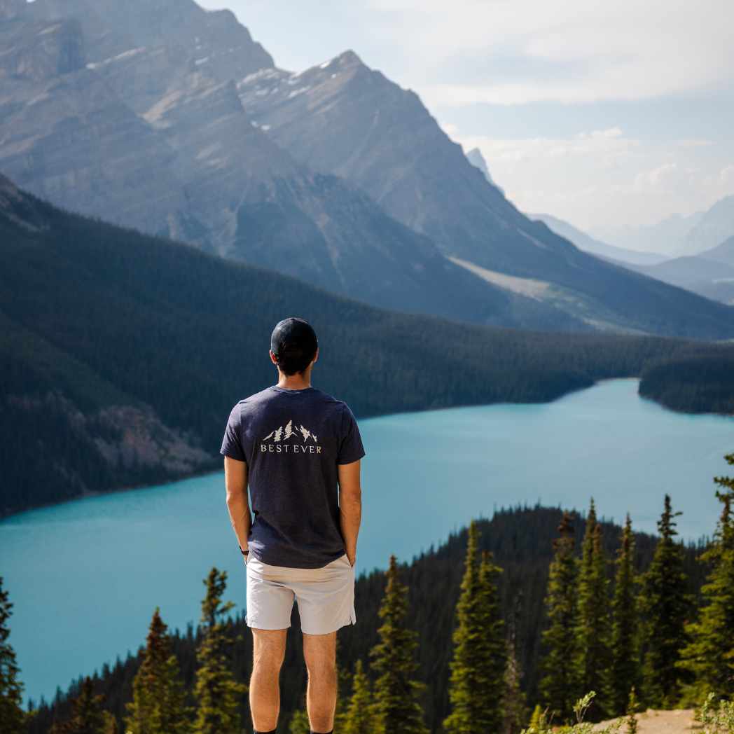 Man Staring at lake wearing Best Ever Mountain Calling T-Shirt