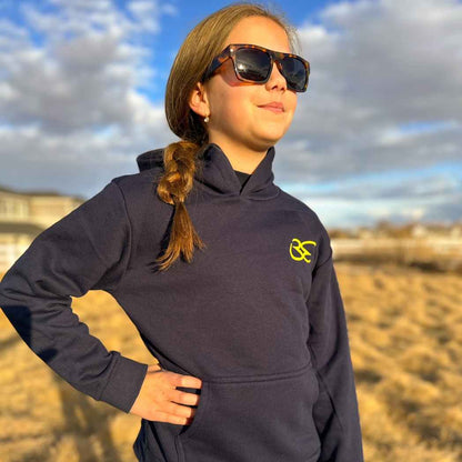 Girl wearing ocean calling hoodie
