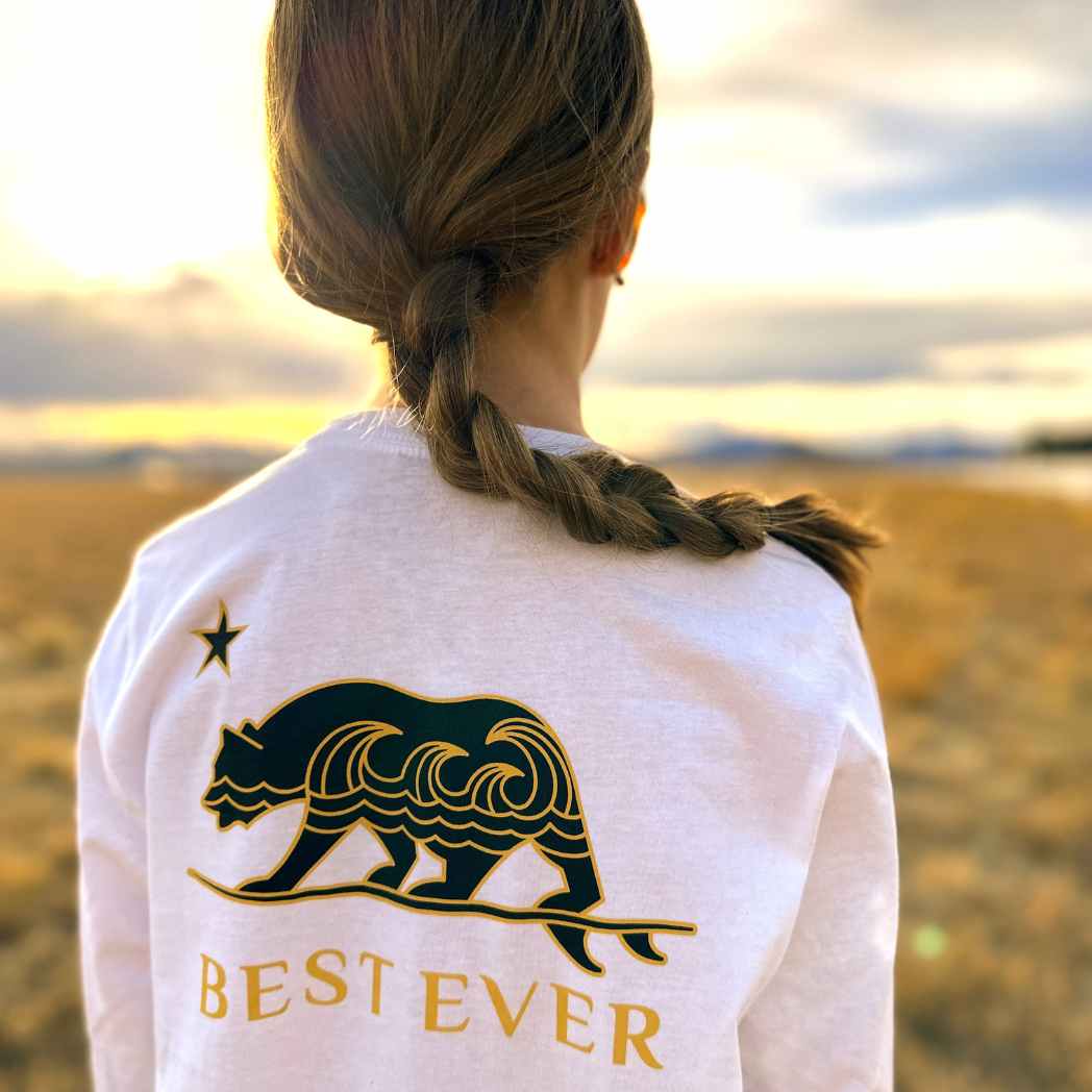 Girl wearing Best Ever bear long sleeve